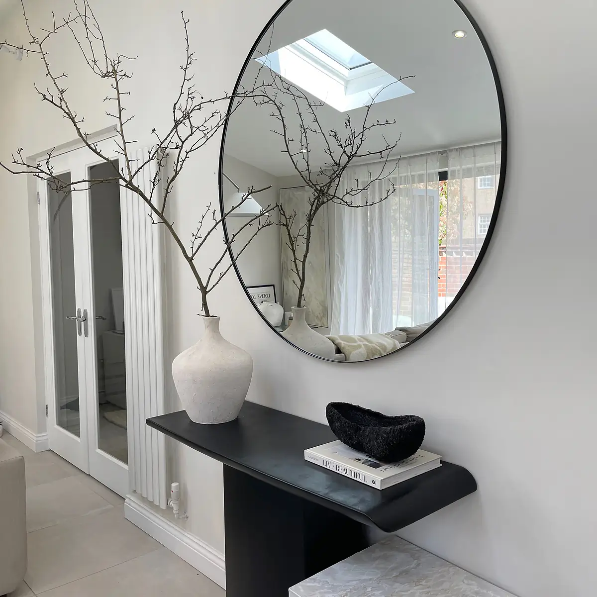 Living Room Mirrors That Add Style, Light, and Luxury